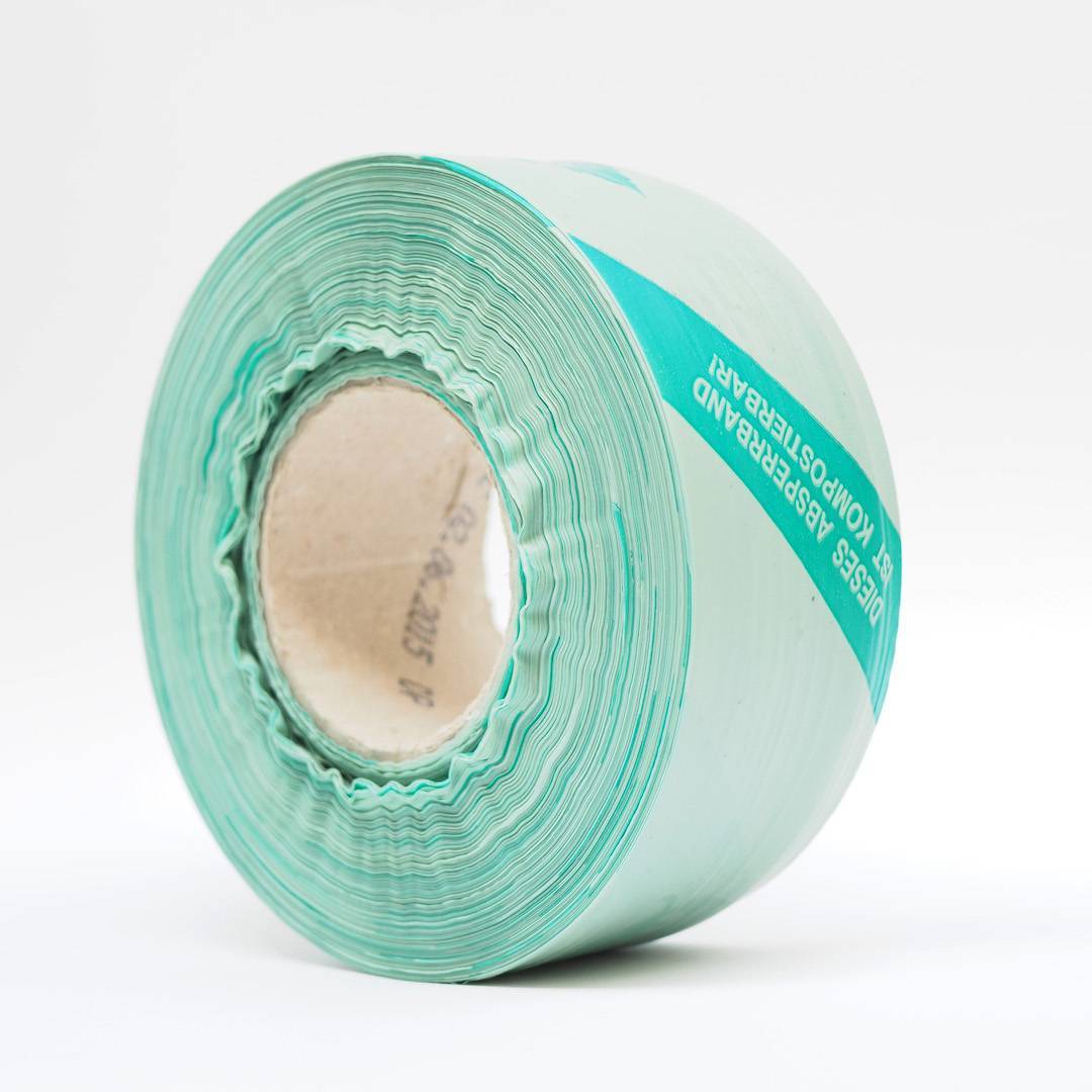 NaKu Absperrband aus Biokunststoff. 100% biologisch abbaubar. Rolle seitlich.