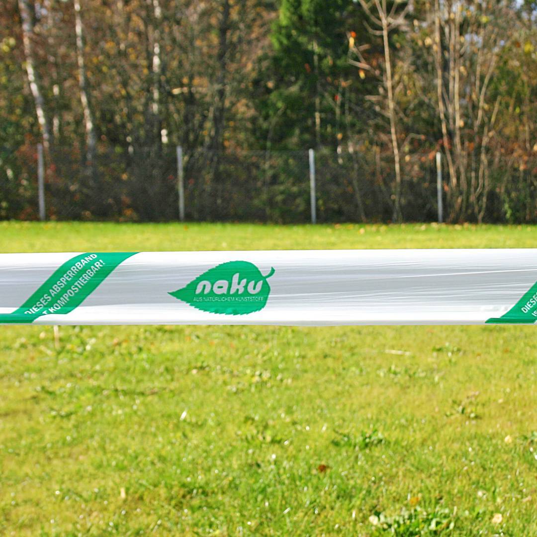 NaKu Absperrband aus Biokunststoff. 100% biologisch abbaubar. Aufgespannt.